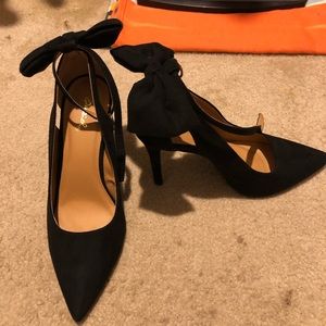 NWOT Black suede bow heels. 4 inches